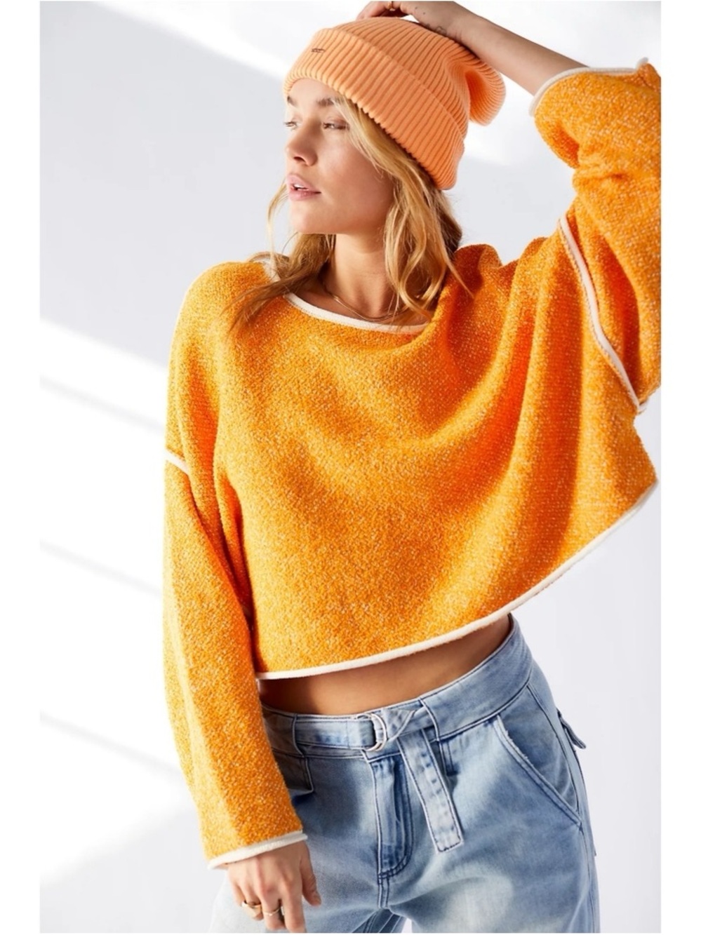 Free People Bardot Solid Sweater in the shade Orange Peel Oversized Bohemian